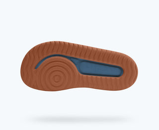 Native Chase Big Kids sandals in Oasis Blue and Sierra Brown, featuring durable straps and comfortable soles for outdoor wear.