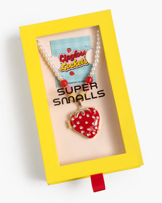 Super Smalls Strawberry Surprise Lipgloss Locket
Red strawberry-shaped locket with pearls in a yellow box labeled 'Super Smalls'.