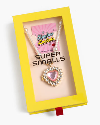 Sweetheart Surprise Lipgloss Locket
Heart-shaped pendant necklace in a yellow box with 'Super Smalls' branding.