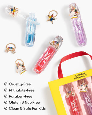 Super Smalls Gloss It Rainbow Lip Gloss Ring Set
Super Smalls lip gloss set with packaging on a white background, featuring colorful lip gloss tubes and a red strap.