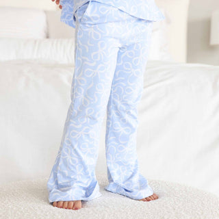 Caden Lane girl's two-piece flare lounge pajama set in blue with bows, featuring a cozy top and matching pants, perfect for bedtime.
