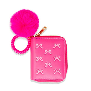 Zomi Gems 3D Bow Pom Pom Zip Wallet - Hot Pink
Pink pouch with white bow patterns and a matching pink hair tie on a white background