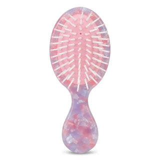 Iscream Mini Hair Brush
Tie-dye hairbrush on a white background