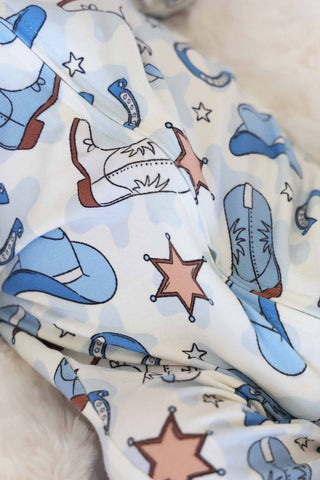 Caden Lane Rodeo Dreams Blue zipper footie for babies, featuring a soft, cozy fabric with playful rodeo-themed print.