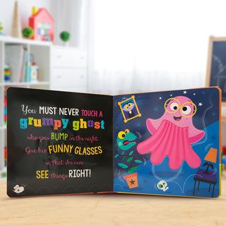 Scholastic Never Touch a Grumpy Bat! Board Book
Open book with a colorful illustration of a pink ghost wearing glasses on a blue background.