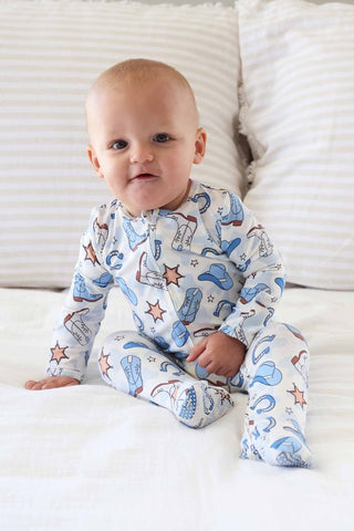 Caden Lane Rodeo Dreams Blue zipper footie for babies, featuring soft fabric and playful rodeo-themed print.