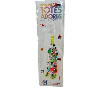 Sunshine & Glitter Adorbs Bag Charm keychain featuring colorful, glittery design with sun and star accents.
