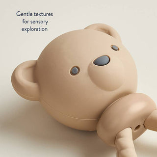 Itzy Ritzy Sweetie Rattle™ - Bear
Beige teddy bear toy with text 'Gentle textures for sensory exploration' on a light background