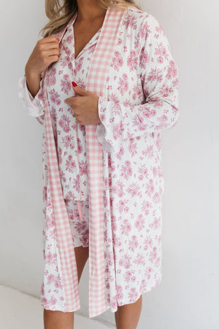 In My Jammers Blush Rose Garden Women's Robe
Woman wearing a pink floral robe over a matching nightgown on a plain background