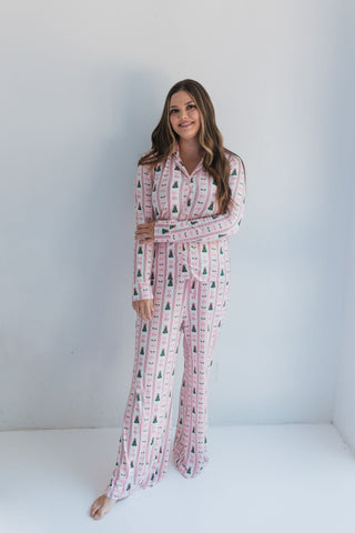 In My Jammers Pinkmas Women’s Set
Woman wearing a pink pajama set with a pattern against a white background