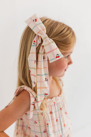 In My Jammers Cherry Grid Bow Clip