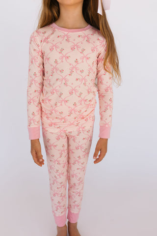 In My Jammers Rosie Bow two-piece pajamas set featuring a playful design and comfortable fabric, perfect for relaxing nights.