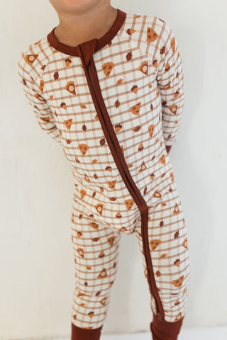 In My Jammers Zipper Romper - Spiced Pie
Child wearing a onesie with brown and white pattern on a plain background
