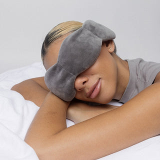 Noppod Weighted Sleep Eye Mask - Elephant
Person wearing a gray sleep mask on a white background