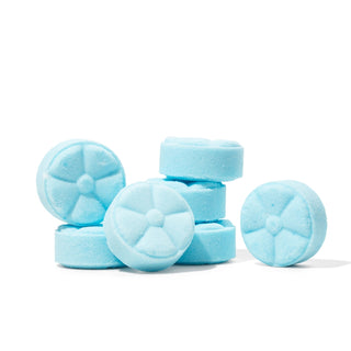 The Lavish Goat Shower Steamers Box - Soothe: Eucalyptus Mint
Stack of light blue chewable tablets on a white background