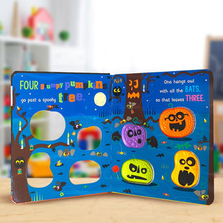 Never Touch the Grumpy Pumpkins Board Book
Children's Halloween-themed book with interactive elements on a wooden surface.