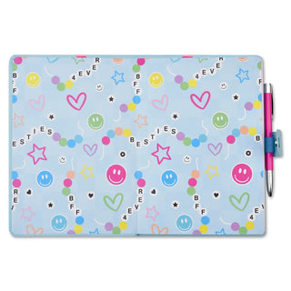 Iscream Besties Journal
Notebook with colorful patterns and a pen on a white background