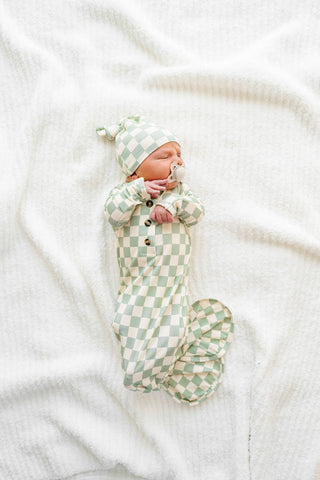 Lou Lou and Company Knit Knotted Gown in Kirby color, featuring soft fabric and a stylish knotted design for comfortable baby wear.