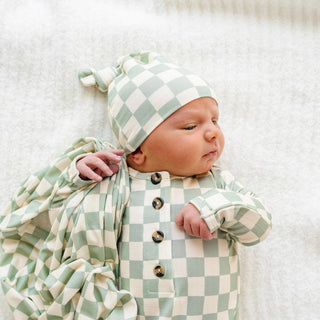 Lou Lou and Company knit outfit set featuring a cozy top and matching bottoms for children, in soft, neutral colors.