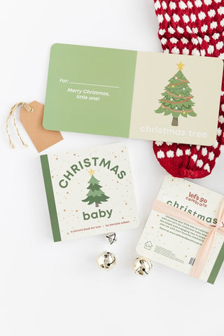 Left Hand Book House Christmas Baby board book for babies, featuring festive holiday illustrations and durable pages.