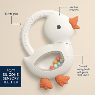 Itzy Ritzy Bitzy Shake silicone teether with rattle in goose color, designed for soothing and entertaining babies.