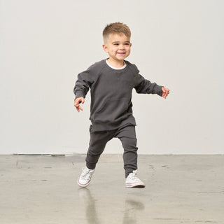Little Bipsy Pocket Pullover - Shadow
Child wearing a gray outfit on a plain background