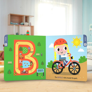 D is for Dump Truck Lift The Flap Board Book
Children's book with a colorful illustration of a child riding a bicycle on a wooden surface.