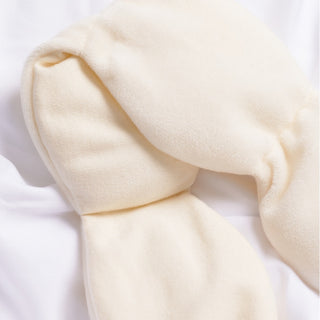 Noppod Weighted Sleep Eye Mask - Bone
Close-up of beige fabric on a white background