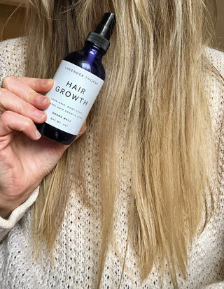 Lavender Thorne Hair Growth Serum bottle with dropper, natural hair care product for stimulating hair growth and healthy scalp.