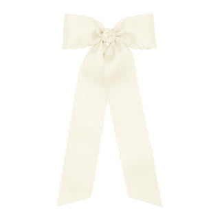 Wee Ones medium moonstitch grosgrain streamer hair bow on clippie, featuring navy and tan colors with a stitched design.