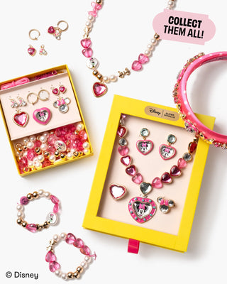 Super Smalls Disney Minnie Mouse Jeweled Headband
Children's jewelry set with pink and gold elements, including necklaces and bracelets, on a white background.
