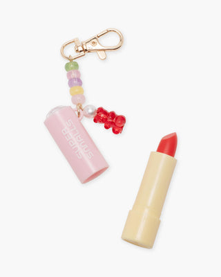 Super Smalls Candy Cutie Lip Balm Key Chain with colorful lip gloss container and key ring, featuring playful candy design.