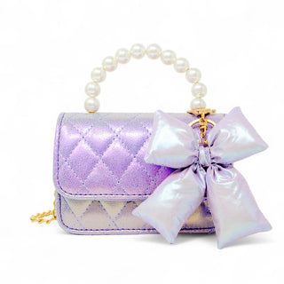 Zomi Gems Shiny Quilted Fluffy Bow Handbag - Purple
Purple quilted handbag with a large bow and pearl handle on a white background