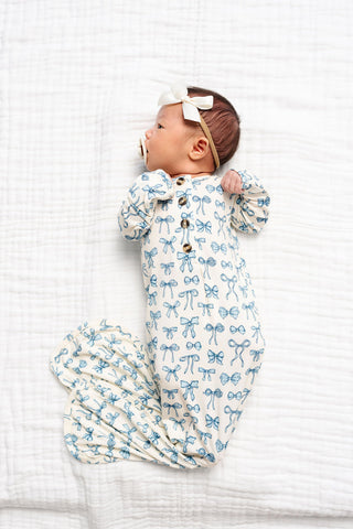 Lou Lou and Company Stella knotted gown for babies, featuring a soft fabric and adorable design suitable for newborns.