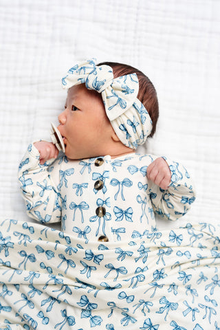 Lou Lou and Company Stella headband featuring soft fabric and bow detail, perfect for infants and toddlers.