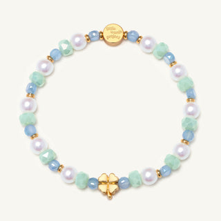 Four Leaf Clover 
Little Words Project Bracelet - Beaded Charm Pastel beaded bracelet with gold accents on a white background