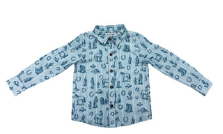 Alto Modas George Shirt- Blue Western Toile 
A light blue long-sleeve button-up shirt with a dark blue western-themed print featuring boots, horseshoes, and cacti, displayed flat against a white background.