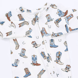 Angel Dear 2 Way Zipper Footie - Buckaroo Boots
A white baby zip-up sleeper or romper printed with a playful pattern of cowboy boots, horseshoes, and small western-style icons in blue, brown, tan, and gray.