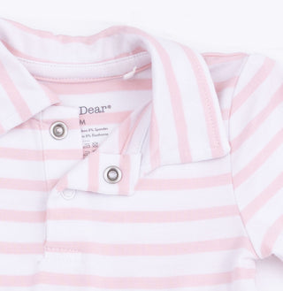 Angel Dear Long Sleeve Tennis Bodysuit Dress - Football Dot and Stripe
Close-up of a pink and white striped baby outfit with 'Dear' branding.