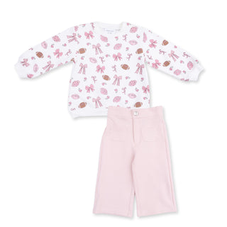 Angel Dear Oversized Sweatshirt and Baby Bells - Footballs and Bows
Children's outfit with patterned long-sleeve shirt and pink pants on a white background