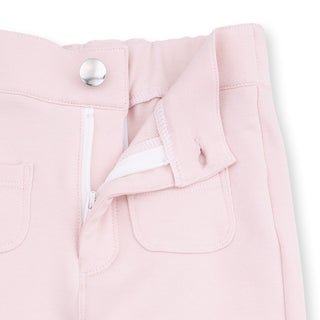 Angel Dear Oversized Sweatshirt and Baby Bells - Footballs and Bows
Close-up of a pink jacket with a button and zipper on a white background