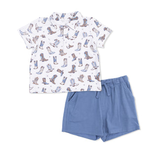Angel Dear Polo Shirt & Casual Short Set - Cowboy Boots
Children's shirt with cowboy boot pattern and blue shorts on a white background