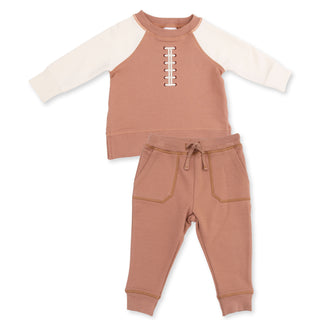 Angel Dear Raglan Sweatshirt and Jogger Set - Football Laces
A toddler's two-piece clothing set featuring a long-sleeve top with cream raglan sleeves and a dusty rose ribbed body, paired with matching dusty rose jogger pants with contrast stitching and a drawstring waist.