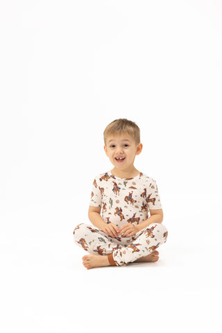 Angel Dear Buckaroo Western short sleeve pajama set for kids, featuring Western-themed print and soft cotton fabric.