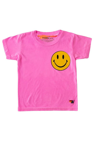 Aviator Nation Kids Smiley 2 Tee - Neon Pink 
Pink t-shirt with a yellow smiley face graphic on a white background