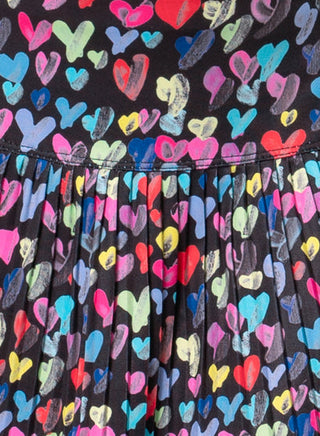 Lucky In Love Thumbprint Hearts Pleated Skirt
Black fabric with colorful heart pattern
