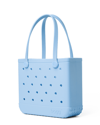 Baby Bogg Bag - Blue Skies and Bogg Bag
Blue tote bag with perforated design on a transparent background