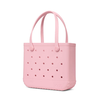Baby Bogg Bag - Blush-Worthy
A light pink silicone tote bag with double top handles and circular ventilation holes, shown on a plain white background.