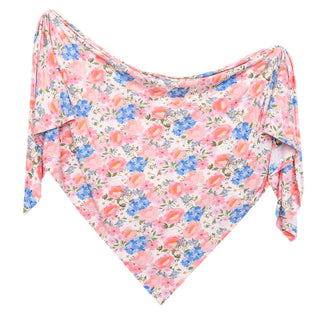 Copper Pearl Bamboo Swaddle Blanket - Penelope
Floral patterned fabric on a white background