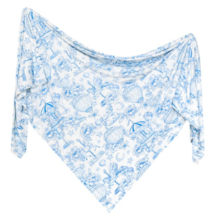 Copper Pearl Bamboo Swaddle Blanket - Vintage Carnival
Blue and white patterned scarf on a white background